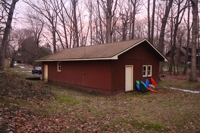 view of outdoor structure at dusk