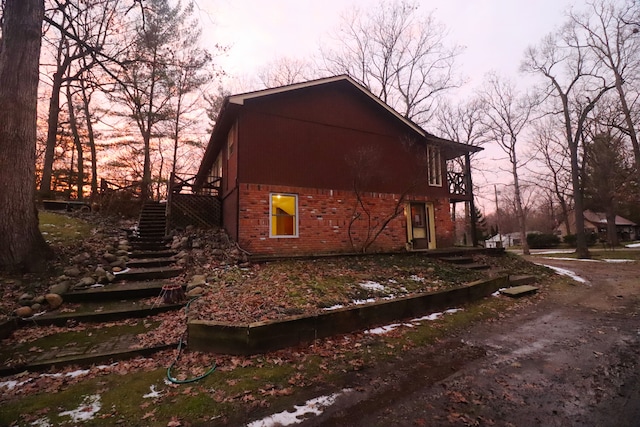 view of property exterior at dusk