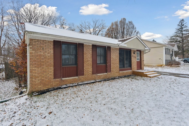 view of snow covered property