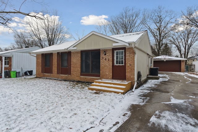 view of front of house featuring an outbuilding and a garage