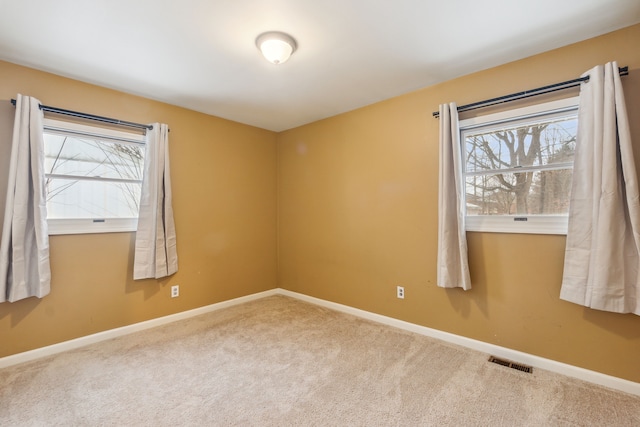 view of carpeted spare room