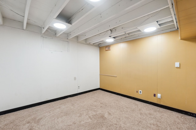 basement with light carpet