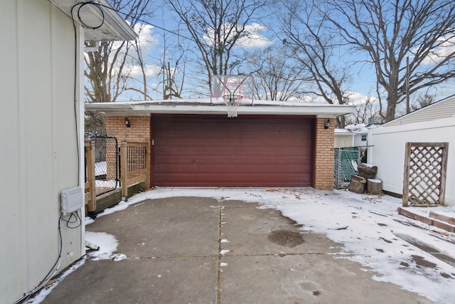 view of snow covered garage