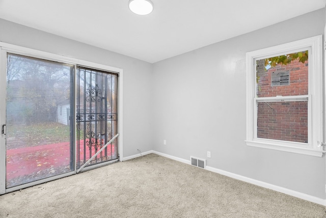 view of carpeted spare room