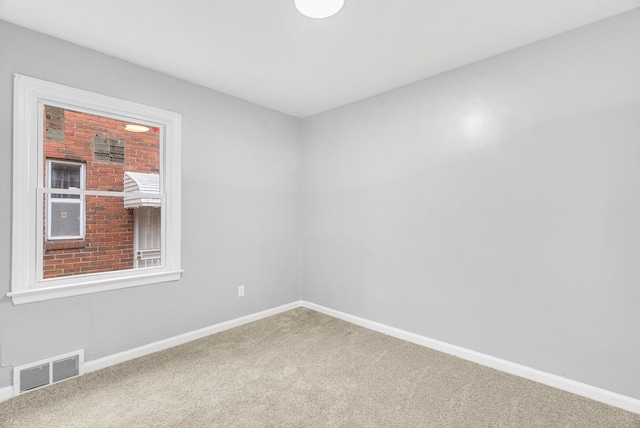 unfurnished room with carpet