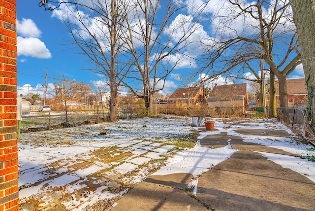 view of yard covered in snow