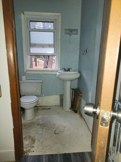 bathroom with sink and toilet