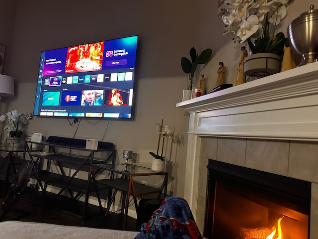 interior space featuring a tile fireplace