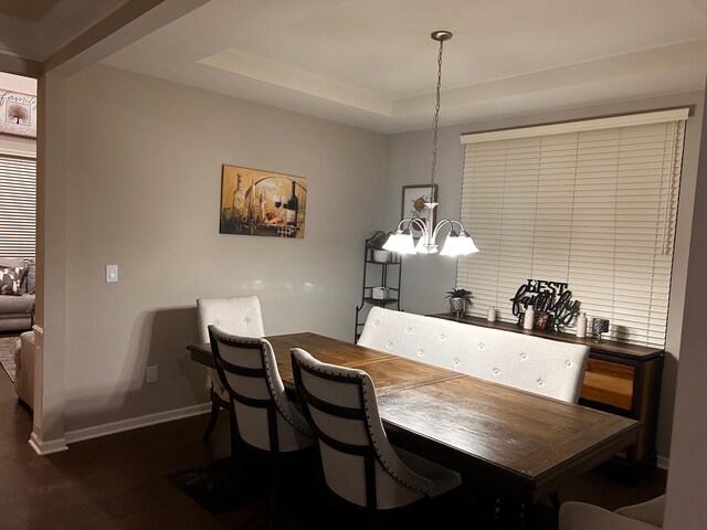 2785 Tulip Way, Commerce Twp, MI 48382 - dining space with a chandelier, dark wood-style floors, and a tray ceiling