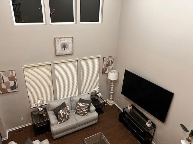 living room with dark wood-type flooring