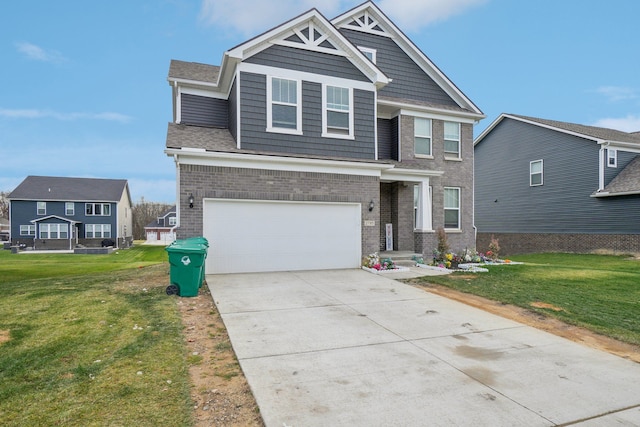2785 Tulip Way, Commerce Twp, MI 48382 - craftsman-style home featuring a garage, a front lawn, brick siding, and driveway