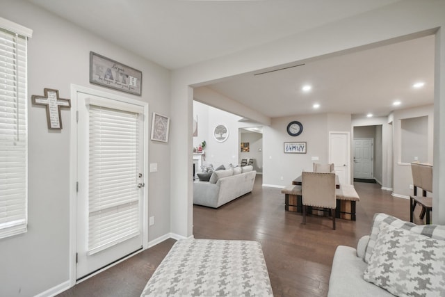 living room with dark wood-type flooring