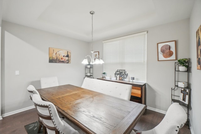 2785 Tulip Way, Commerce Twp, MI 48382 - dining room featuring a raised ceiling and dark wood-style flooring