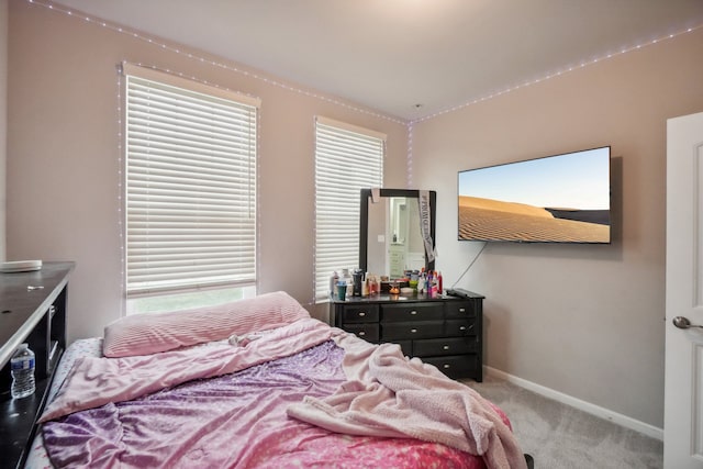 2785 Tulip Way, Commerce Twp, MI 48382 - bedroom with light carpet and baseboards