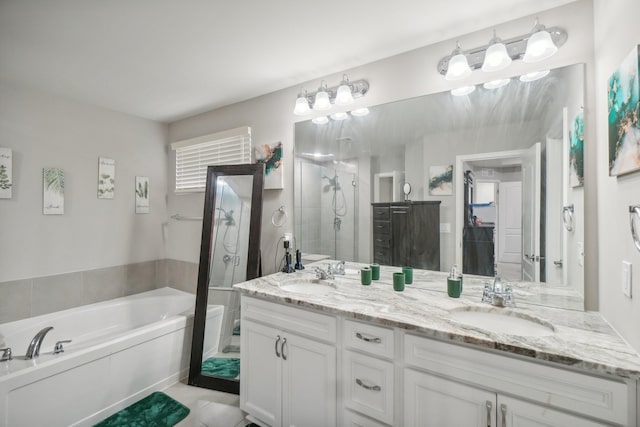2785 Tulip Way, Commerce Twp, MI 48382 - bathroom featuring a stall shower, double vanity, a bath, and tile patterned floors