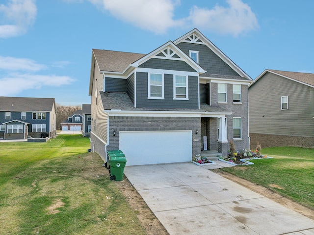 craftsman-style house with a garage and a front lawn