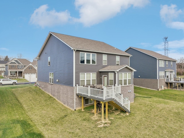 2785 Tulip Way, Commerce Twp, MI 48382 - rear view of property with a wooden deck, a yard, stairway, and brick siding