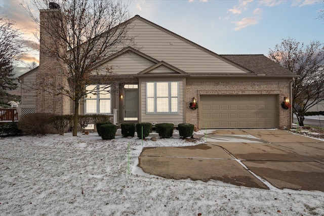 ranch-style home with a garage