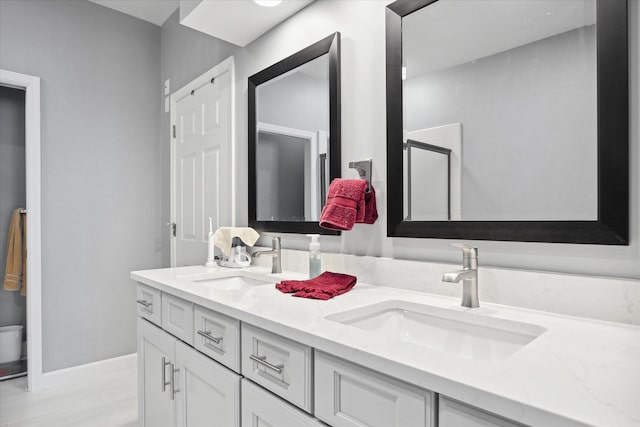 bathroom featuring hardwood / wood-style floors and vanity