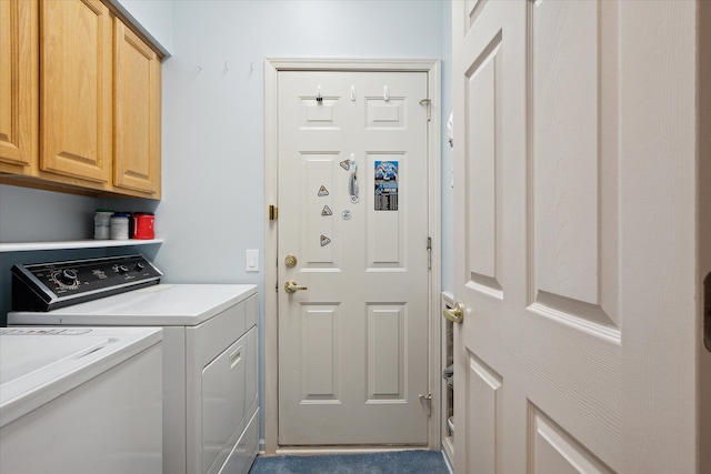 laundry area featuring cabinets, independent washer and dryer, and carpet floors