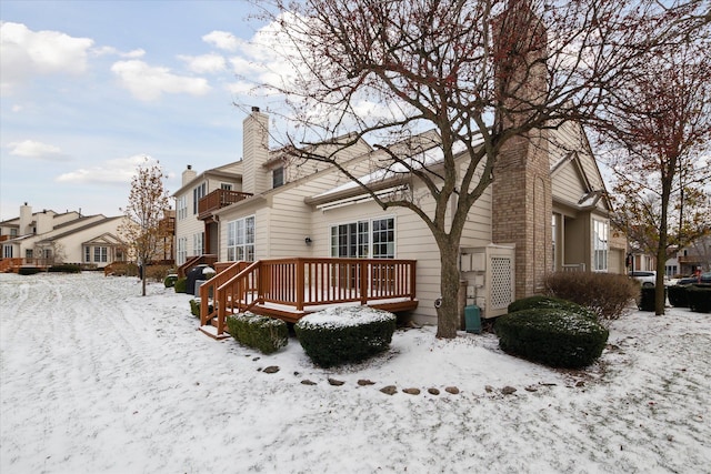 view of snow covered property