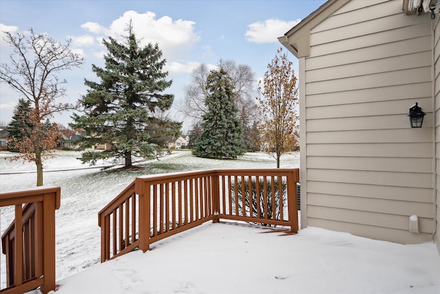 view of snow covered deck