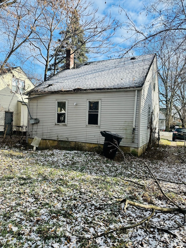 view of snow covered property