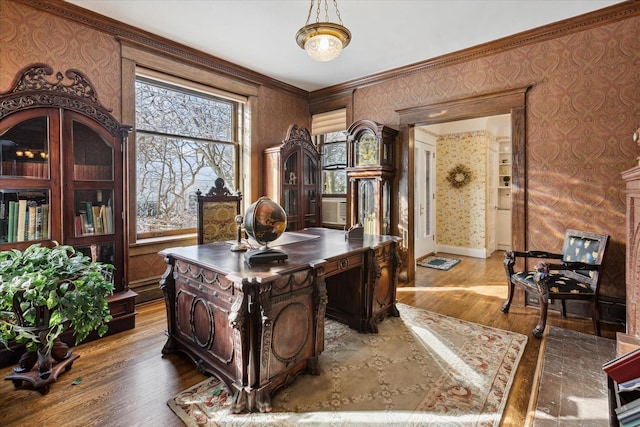 home office with dark hardwood / wood-style flooring and ornamental molding