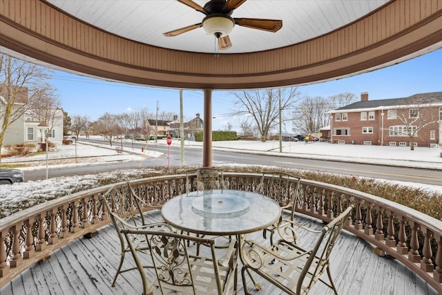 snow covered deck with ceiling fan