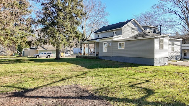 view of side of home featuring a yard