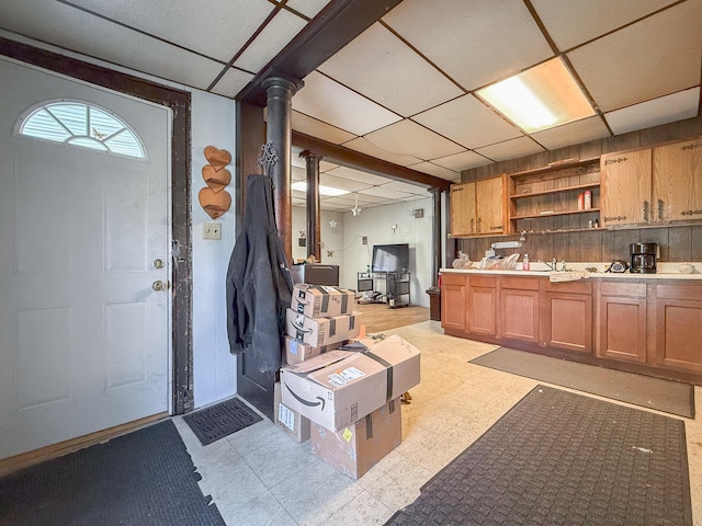 kitchen with a paneled ceiling