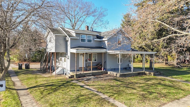 view of front of home featuring a front lawn