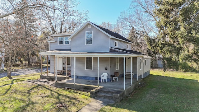 farmhouse with a front yard and a porch