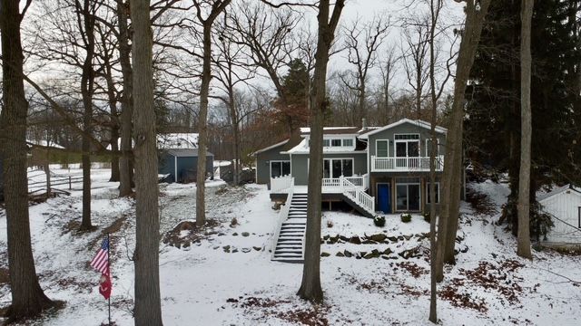 view of snow covered property