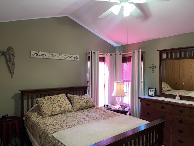 bedroom featuring ceiling fan and vaulted ceiling