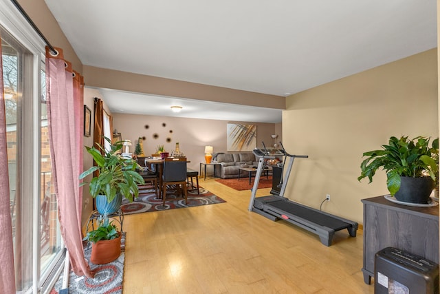 workout area with light wood-type flooring