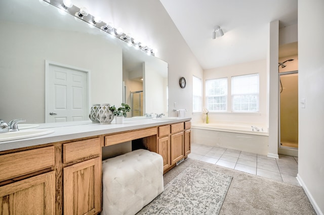 bathroom featuring tile patterned floors, vanity, lofted ceiling, and plus walk in shower