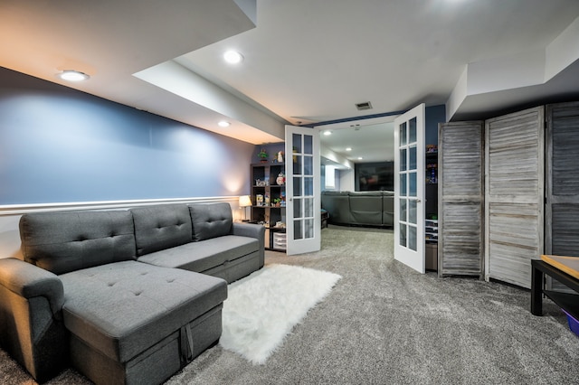 living room featuring carpet and french doors