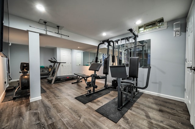 exercise area featuring hardwood / wood-style floors