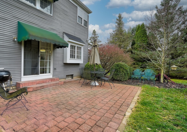 view of patio featuring a grill