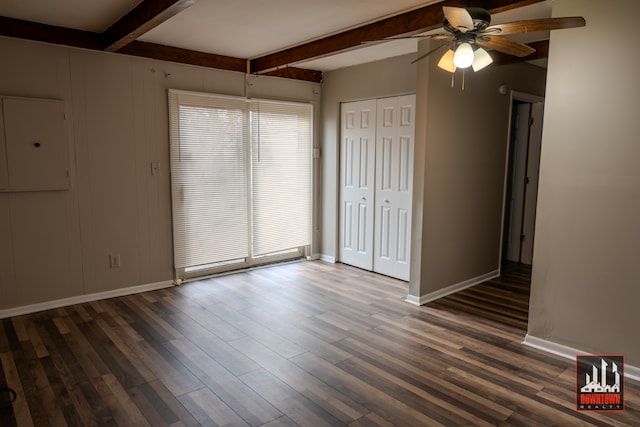 interior space with beamed ceiling, ceiling fan, and dark hardwood / wood-style flooring