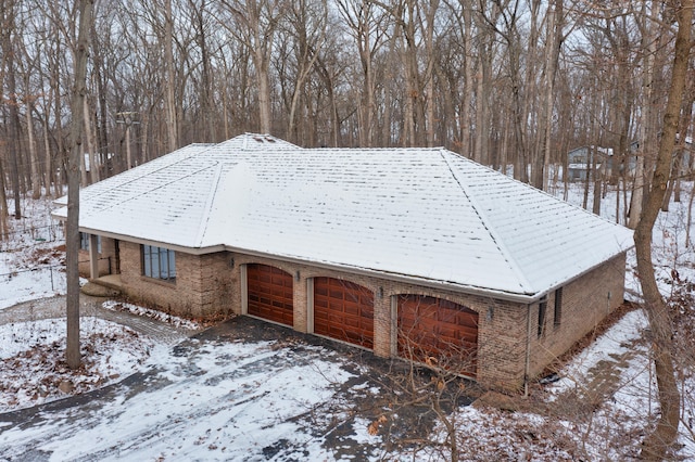 exterior space with brick siding