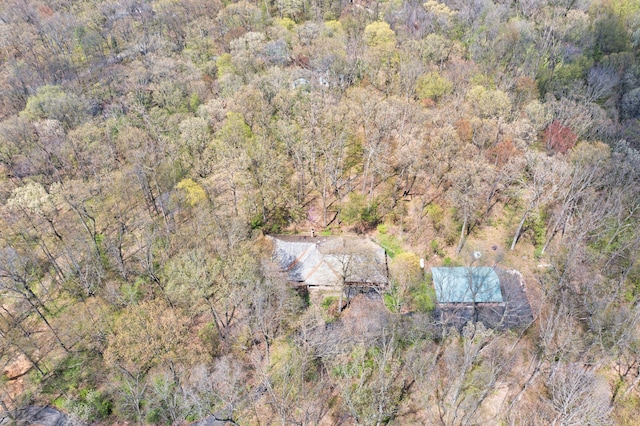 drone / aerial view featuring a view of trees