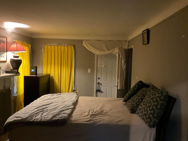 bedroom featuring ornamental molding