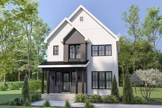 view of front of property with a porch and a front lawn