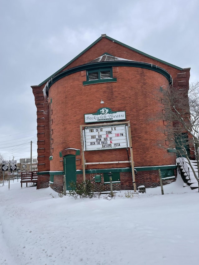 view of snow covered property