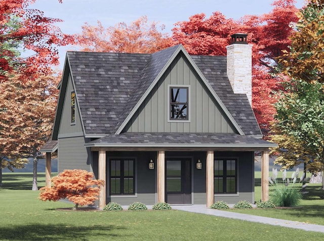 exterior space featuring a chimney, a lawn, board and batten siding, and a shingled roof