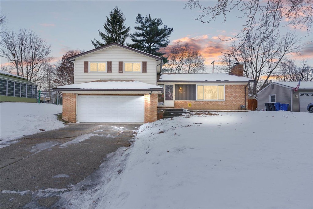 split level home with a garage