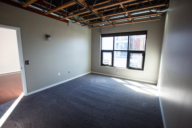 empty room featuring carpet flooring