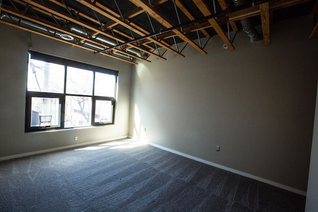 empty room featuring carpet flooring